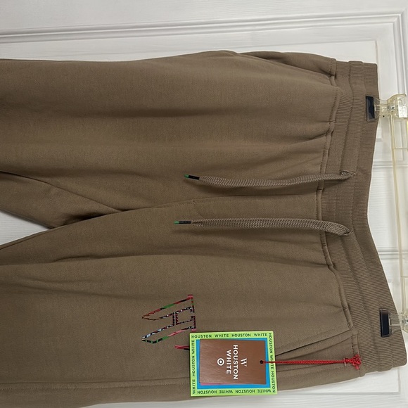 New Sweatpants. Drawstring front. Letter W looks a bit washed off . - Picture 2 of 3